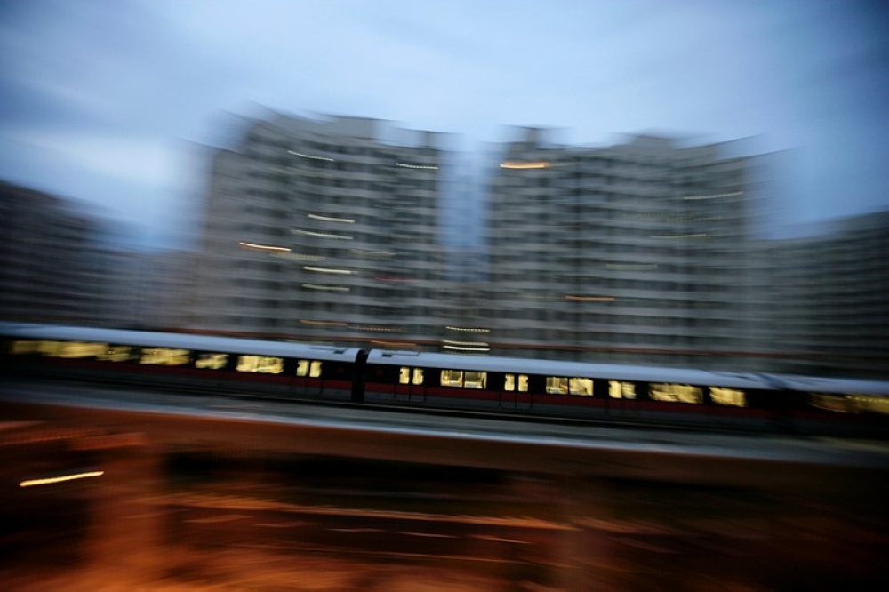 An MRT train travels along a track in a neighbourhood in Singapore February 28, 2010. — Reuters pic