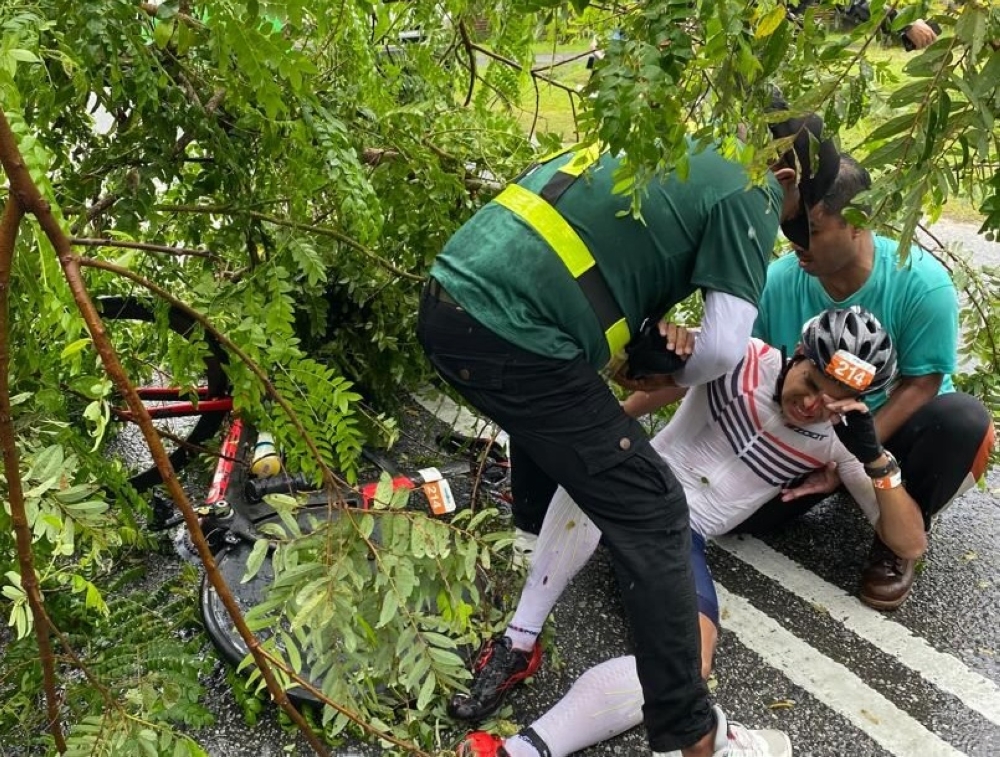 Syed Saddiq is seen getting assistance after a bicycle crash. — Social media pic