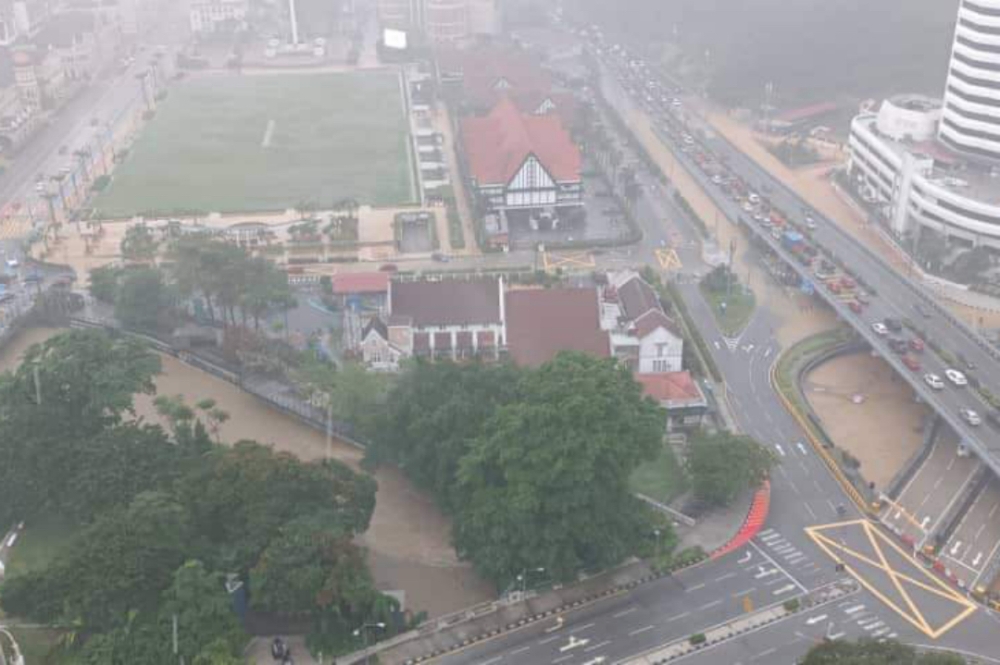 A view of the area near Dataran Merdeka that is being inundated by flash flood. — Picture from Facebook/Warga Wilayah