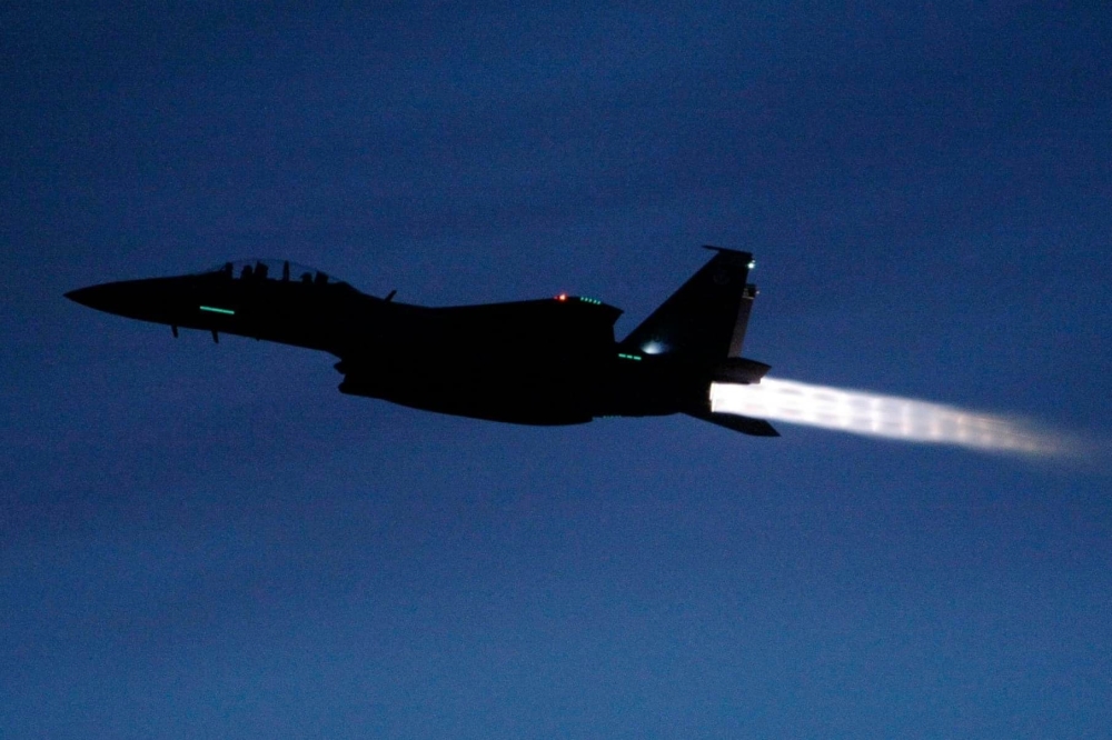 Singapore sent two F-15SGs and escorted the plane to finally land safely at Singapore Changi Airport . — Picture from Facebook/Ng Eng Hen