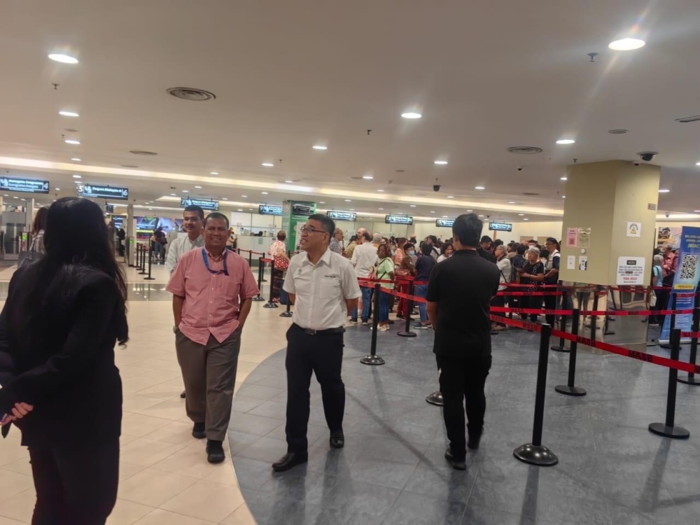 Penang state exco for tourism and creative economy Wong Hon Wai (centre) visiting the Penang International Airport. — Picture courtesy of Wong Hon Wai’s office 