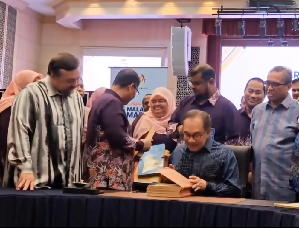 A screenshot from a Bernama video of Prime Minister Datuk Seri Anwar Ibrahim checking on the final preparations for Budget 2025 at the Ministry of Finance in Putrajaya October 17, 2024. — Bernama pic