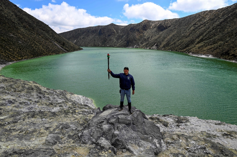 Indigenous guard Jorge Arevalo, from the Pasto ethnic group, poses for a picture at the Green Lake, in Tuquerres, department of Narino, Colombia on August 29, 2024. — AFP pic