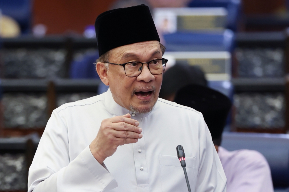 Prime Minister Datuk Seri Anwar Ibrahim outlines five key priorities for the nation's well-being as he tables the MADANI Budget 2025, focusing on economic revitalisation, reform, and addressing the rising cost of living. — Bernama pic