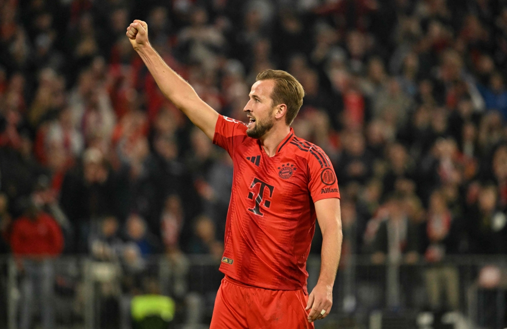 Bayern Munich's English forward #09 Harry Kane celebrates his 2-0 during the German first division Bundesliga football match between FC Bayern Munich and VfB Stuttgart. — AFP