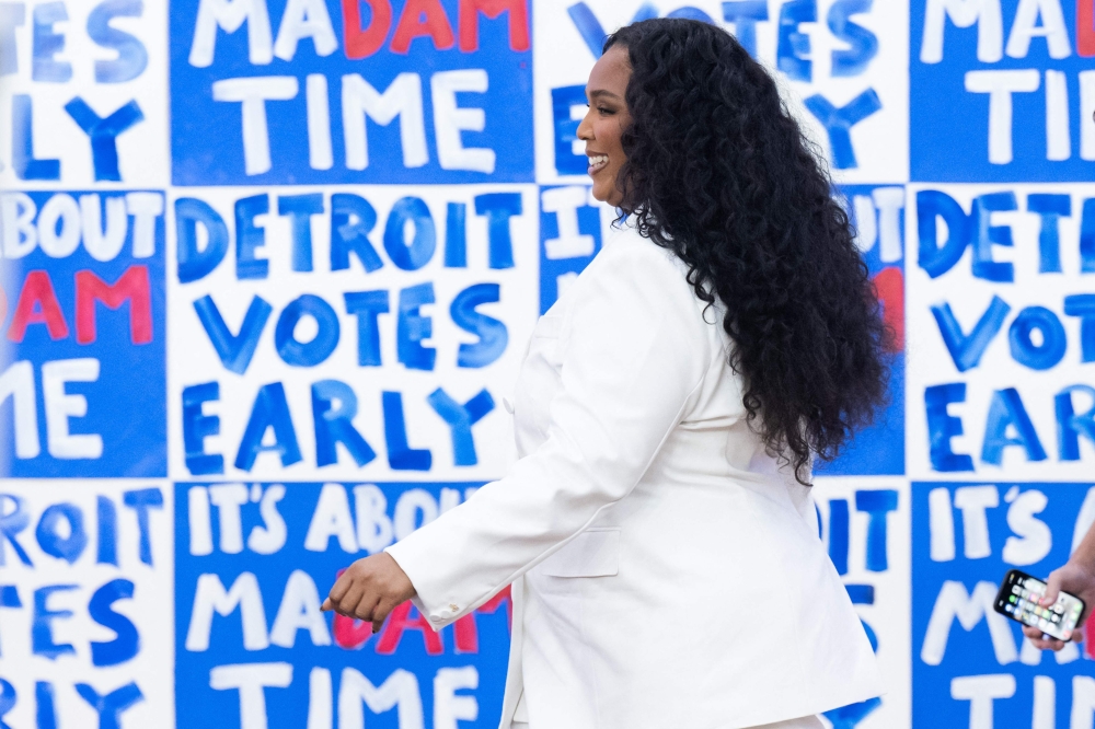 US singer Lizzo attends a get out the vote campaign rally with Vice President and Democratic presidential candidate Kamala Harris at Western International High School in Detroit, Michigan, October 19, 2024. — AFP pic