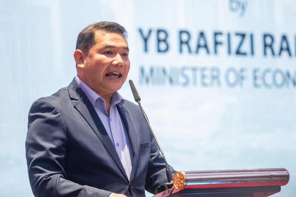 Economy Minister Rafizi Ramli speaks at an event in the Putrajaya International Convention Centre on August 27, 2024. — Picture by Firdaus Latif
