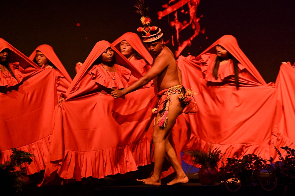 Indigenous artists perform during the opening ceremony of the COP16 summit in Cali, Colombia on October 20, 2024. — AFP pic