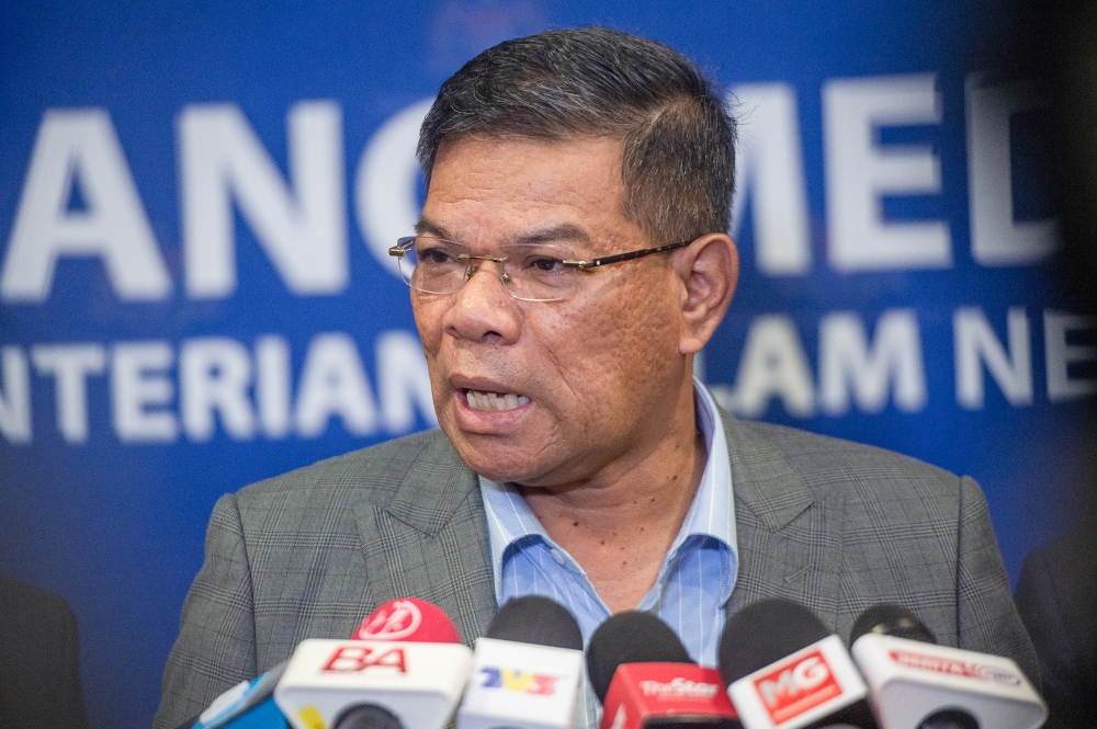 A file photograph shows Home Minister Datuk Seri Saifuddin Nasution Ismail during a press conference in Putrajaya, on June, 2023. — Picture by Shafwan Zaidon
