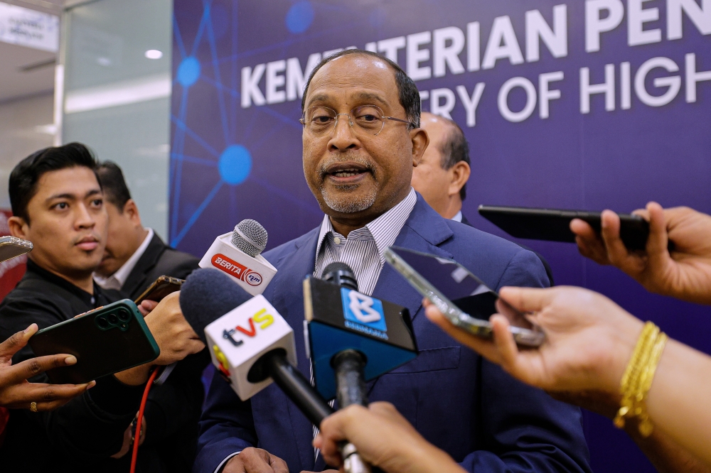 Higher Education Minister Datuk Seri Zambry Abdul Kadir speaks to reporters after the after officiating the 2024 Academia Convention in Putrajaya, on Oct 21, 2024. — Bernama pic