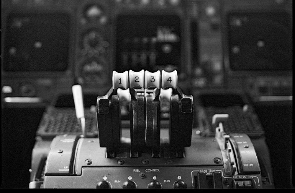 File photo of the numbered throttle controls for the jet engines in the cockpit of a Boeing 747.