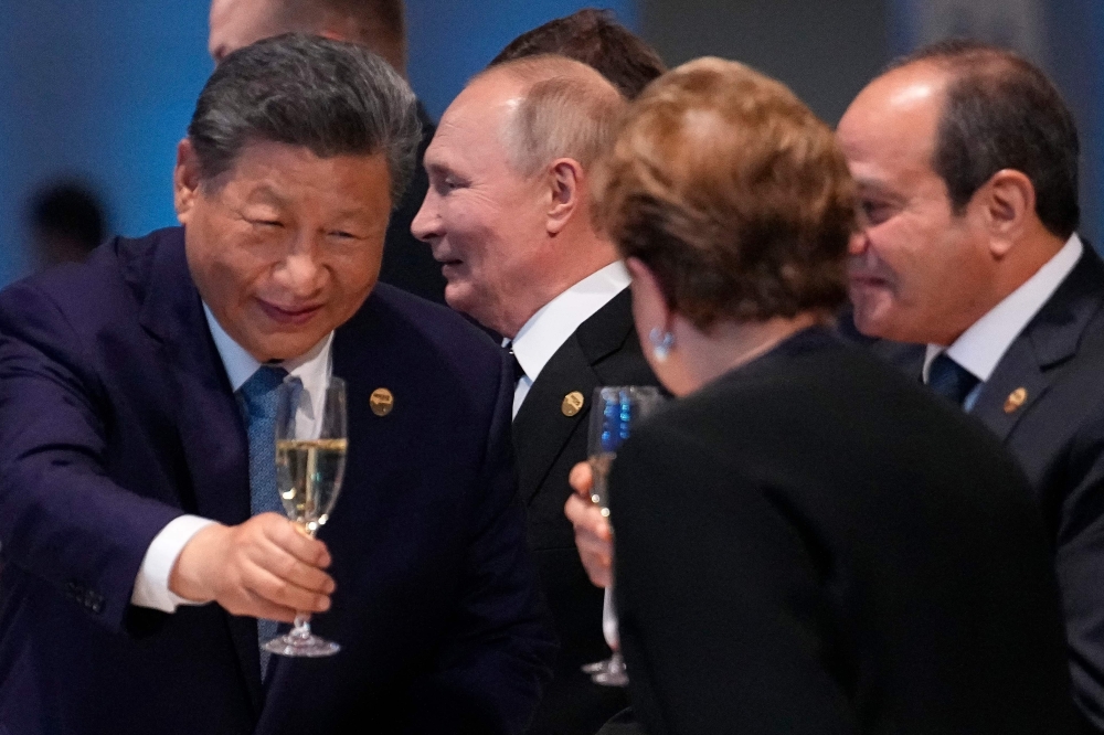 Chinese President Xi Jinping, Russian President Vladimir Putin, New Development Bank President Dilma Rousseff and Egyptian President Abdel Fattah el-Sisi attend a festive reception of the BRICS summit in Kazan on October 23, 2024. — AFP pic