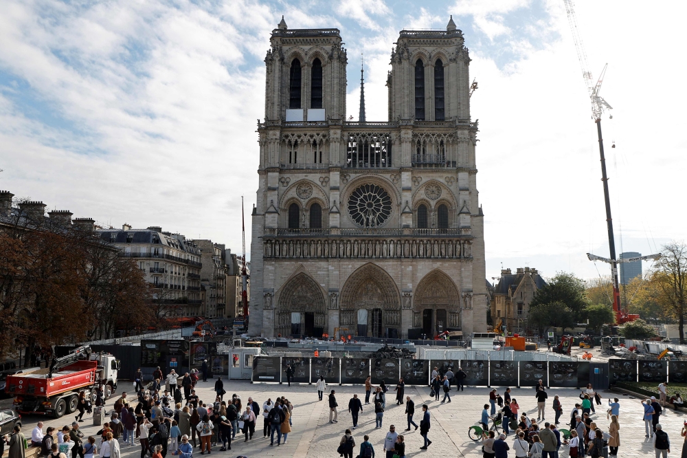 This photograph shows a general view of the Notre-Dame de Paris Cathedral in Paris, on October 21, 2024. The cathedral was partially destroyed when a fire broke out beneath its roof on April 15, 2019. — AFP pic