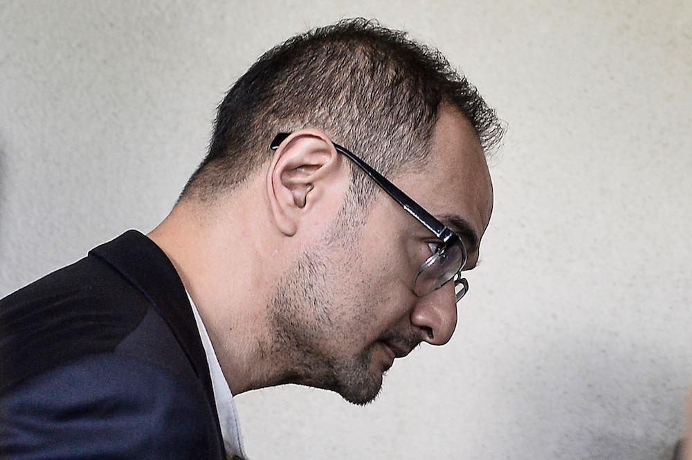 A file photograph show Riza Aziz arriving at the Kuala Lumpur Court Complex on July 4, 2019. — Picture by Miera Zulyana