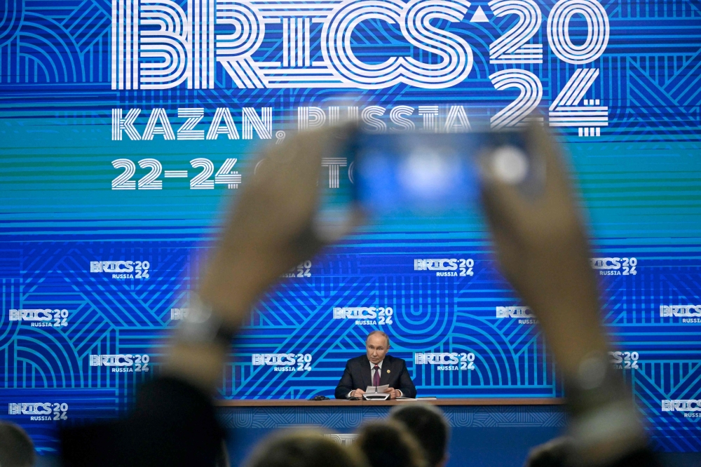 Russia's President Vladimir Putin speaks during the BRICS summit in Kazan on October 24, 2024. — AFP pic