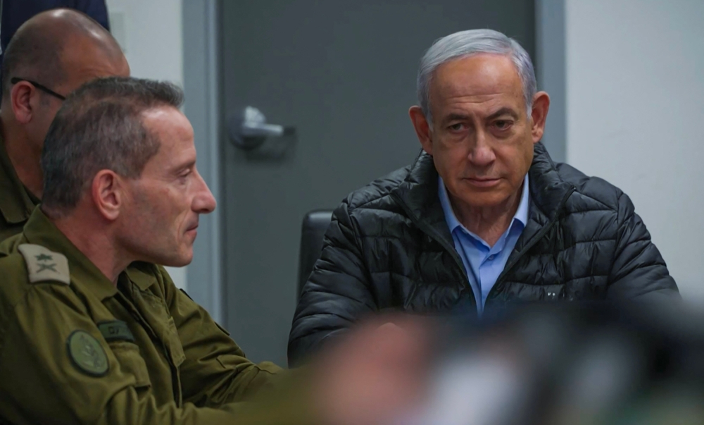 This screen grab taken from a handout video released by the Israeli government press office shows Prime Minister Benjamin Netanyahu attending a meeting in the command center of the defense ministry in Tel Aviv on October 24, 2024, as Israel conducts what it says are 