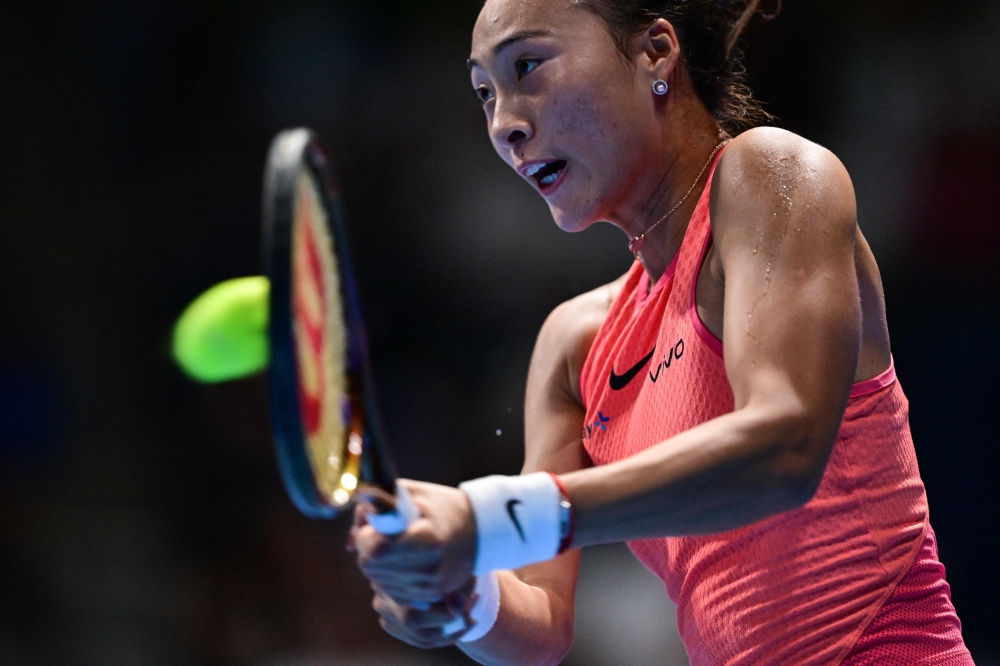 China’s Zheng Qinwen hits a return against Sofia Kenin of the US during their women’s singles final match at the Pan Pacific Open in Tokyo October 27, 2024. — AFP pic