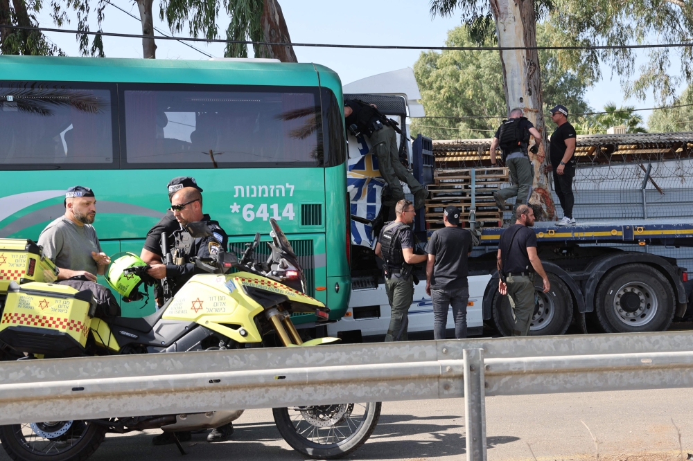 Israeli police inspect the truck at the site of a ramming attack in Ramat Hasharon, north of Tel Aviv October 27, 2024. — AFP pic