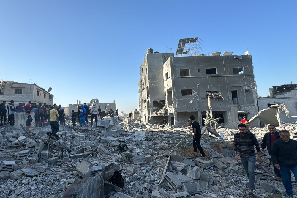 Palestinians inspect the damage after an overnight Israeli airstrike in Beit Lahia the northern Gaza Strip on October 27, 2024. — AFP pic