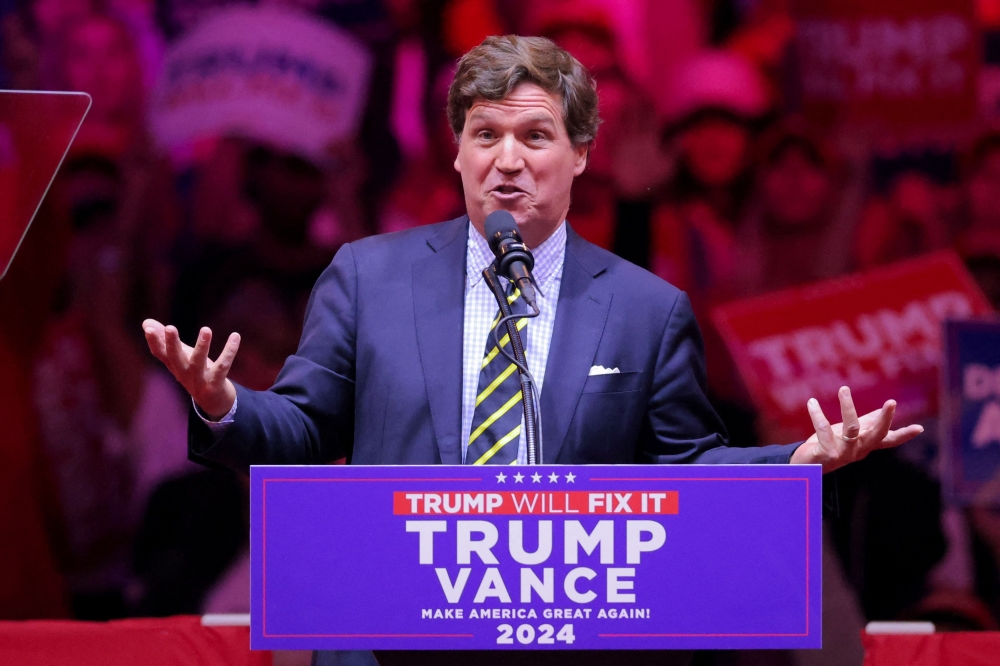 Former Fox News talk show host Tucker Carlson at Donald Trump’s Madison Square Garden rally yesterday, where he made disparaging remarks about Democrat Kamala Harris, misidentifying her heritage as Samoan-Malaysian. — Reuters pic