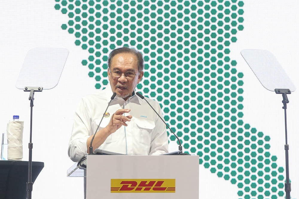 Prime Minister Datuk Seri Anwar Ibrahim deliver his speech during the launch of the DHL Express KL Gateway at KLIA AirCargo Terminal One in Sepang on October 28, 2024. — Picture by Yusof Mat Isa