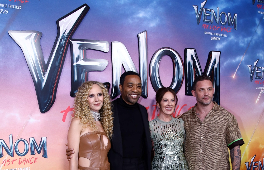 (From left) British actress Juno Temple, US actor Chiwetel Ejiofor, British filmmaker Kelly Marcel and British actor Tom Hardy attend the world premiere of ‘Venom: The Last Dance’ at the Regal Times Square in New York October 21, 2024. — AFP pic