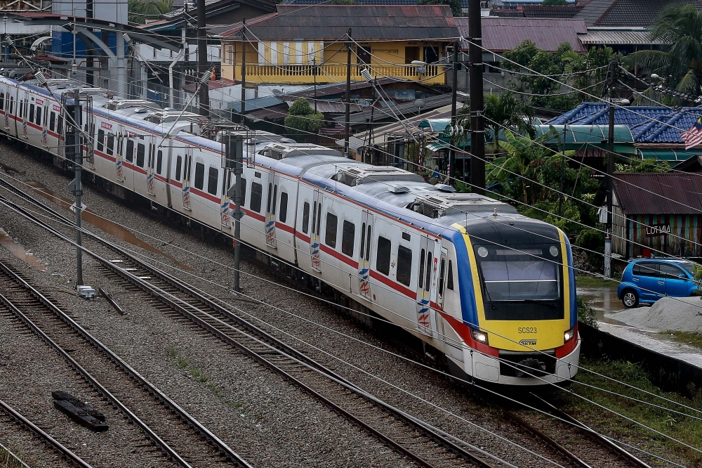 The Electric Train Service and KTM Komuter’s operations were disrupted on Friday by a third-party tree-cutting activity. — Picture by Sayuti Zainudin 