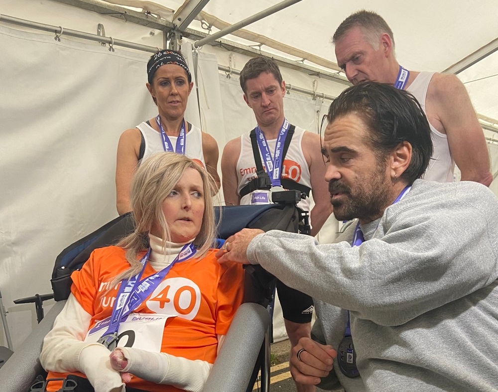 Actor Colin Farrell (front, right) participated in the Dublin Marathon on Sunday, where he pushed an old friend, Emma Fogarty (seated, left) in a wheelchair for the last four kilometres. — Picture via X/