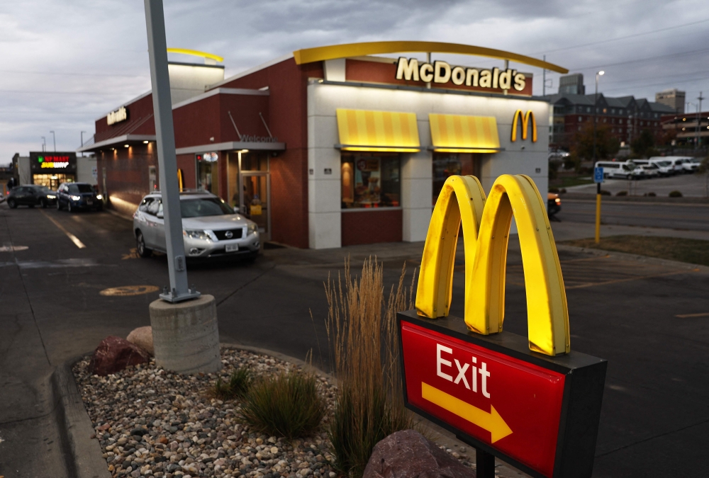 Customers pass in the Drive Thru lane during breakfast hours at a McDonald's restaurant on October 23, 2024 in Omaha, Nebraska. — AFP pic