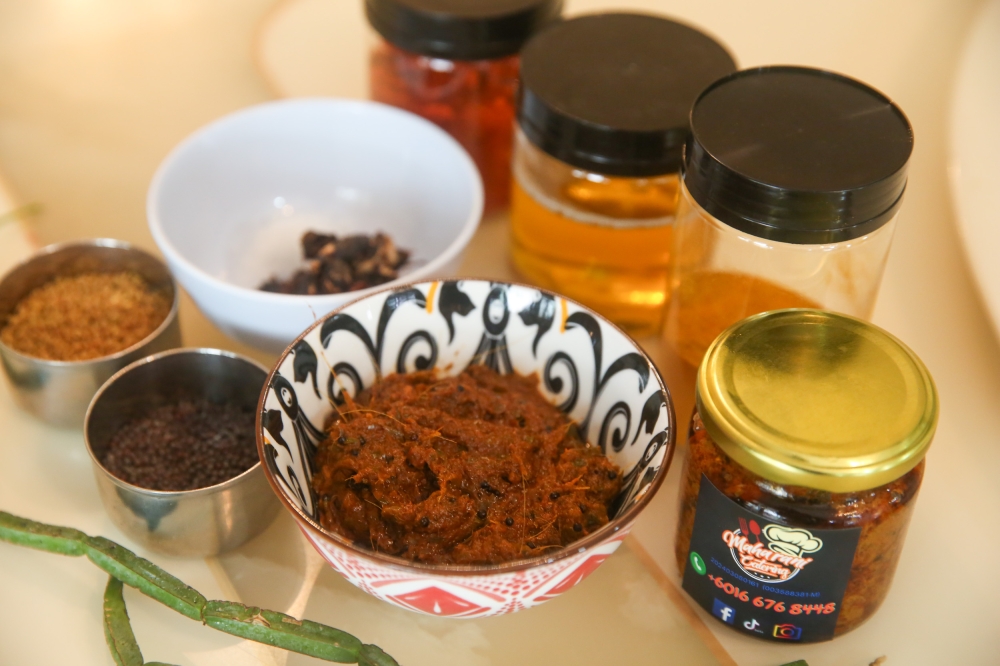 A view of pickled pirandai, made from a plant also known as the adamant creeper or devil’s backbone. — Picture by Choo Choy May .