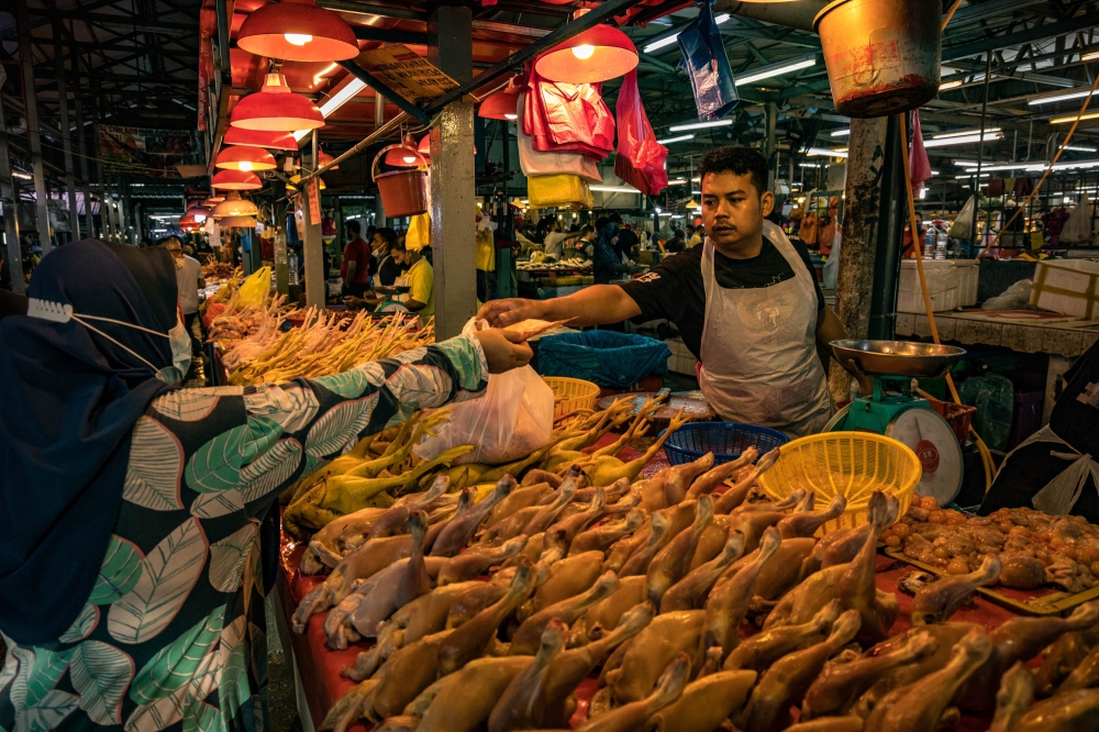 Decent living going by the official definition is the ability to buy a list of goods considered essential, both food and non-food items such as clothing, security and shelter. — Picture by Firdaus Latif