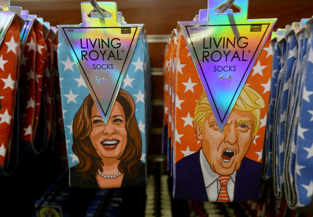 Socks depicting Democratic presidential nominee and US Vice President Kamala Harris and Republican presidential nominee and former US President Donald Trump are displayed for sale in a gift shop in Washington, US, October 31, 2024. — Reuters pic 
