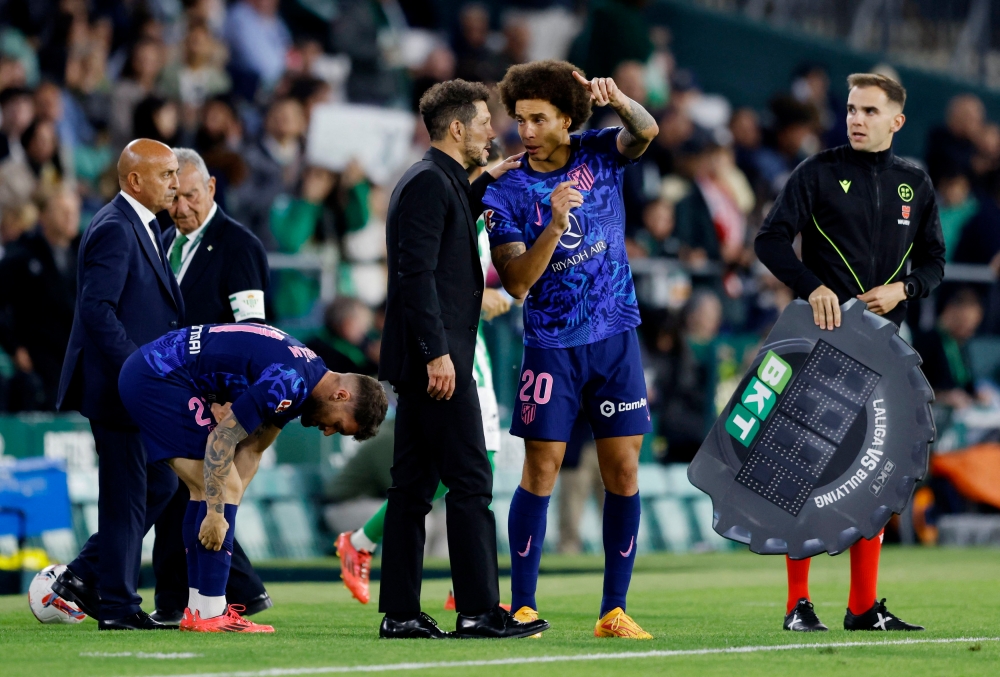 Atletico Madrid on Friday permanently banned nine of their supporters from attending matches after incidents of crowd trouble and racist behaviour. — AFP pic