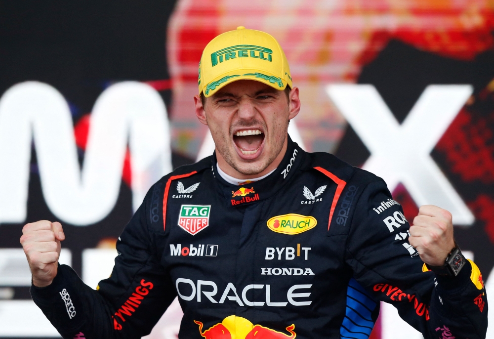 Red Bull Racing's Dutch driver Max Verstappen celebrates at the podium of the Formula One Sao Paulo Grand Prix in Sao Paulo, Brazil. — AFP