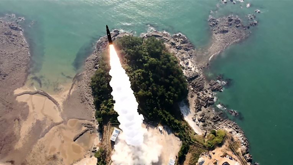 A handout photo by the South Korean Defence Ministry taken on November 7 showing a Hyunmoo-2 short-range missile being launched into the West Sea from Anheung testing site in during a live-fire exercise. South Korea fired a ballistic missile into the sea in a show of force yesterday after North Korea's recent salvo of missile launches. — AFP