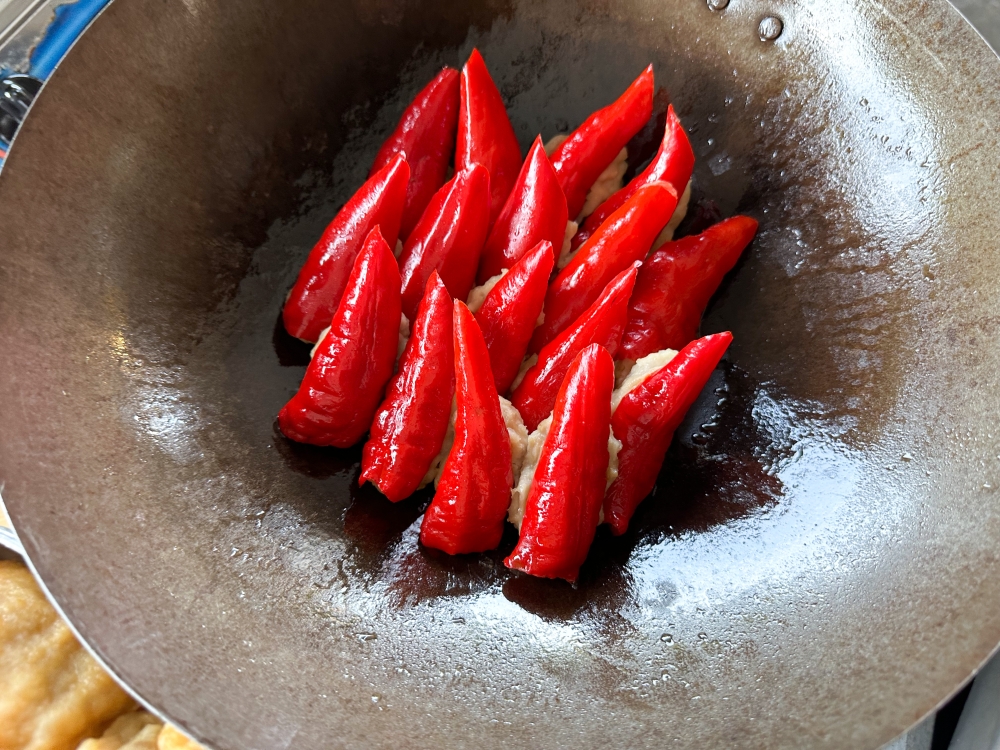 Perky red chillies stuffed with a chunky mix of fish paste and fatty pork are ready to be relished at Ampang’s Jin Ji Xiang Restaurant. — Picture by Lee Khang Yi