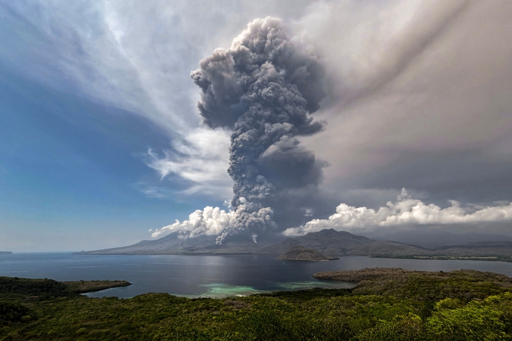 This aerial handout picture taken on November 9, 2024 and released on November 10, 2024 by the National Disaster Mitigation Agency shows the eruption of Mount Lewotobi Laki Laki as seen from the Eputobi rest area in East Flores, East Nusa Tenggara. — Indonesia National Disaster Mitigation Agency handout pic via AFP