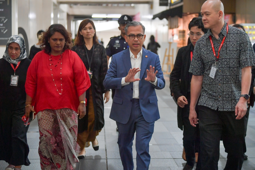 Communications Minister Fahmi Fadzil visits exhibition booths during the Eighth International Search Conference ‘Media Evolution — Navigating Sustainability and Disruption in a Dynamic World’ at Taylor’s University in Kuala Lumpur November 11, 2024. — Bernama pic