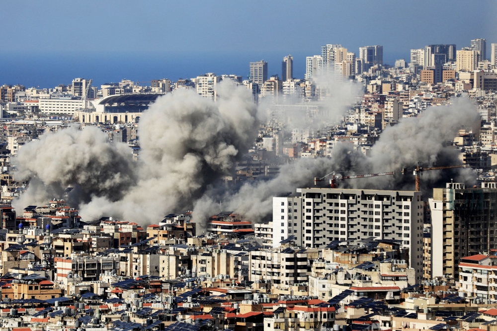 Smoke rises from the site of an Israeli airstrike that targeted a neighbourhood in Beirut’s southern suburbs on November 12, 2024. — AFP pic 