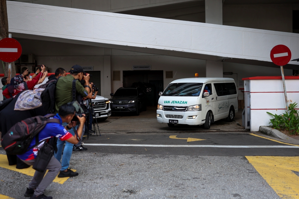 A van carrying the body of former finance minister Tun Daim Zainuddin leaves Assunta Hospital in Petaling Jaya, Selangor for his house in Bukit Tunku, Kuala Lumpur on November 13, 2024. — Bernama pic