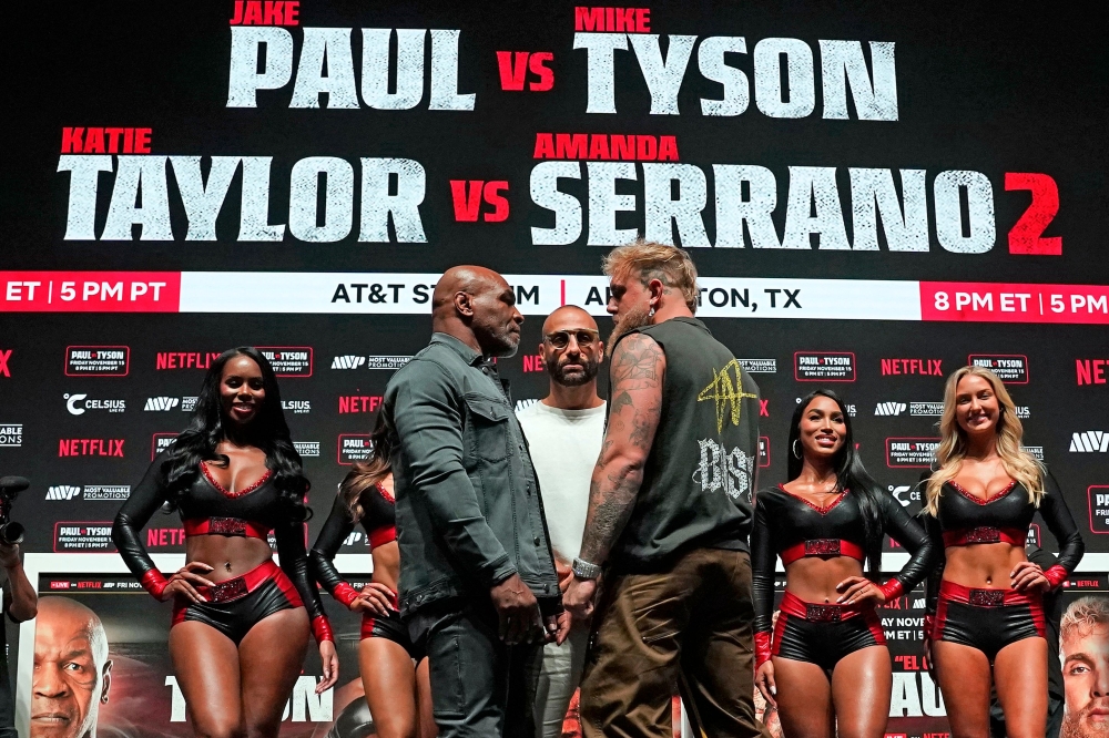 US boxer Mike Tyson (L) and US boxer-actor Jake Paul (R) face each other during a press conference ahead of their heavyweight bout at The Pavilion at Toyota Music Factory in Irving, Texas on November 13. — AFP pic 