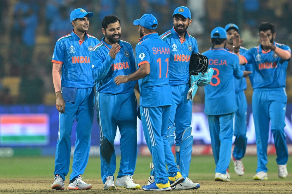 India's players celebrate their win at the end of the 2023 ICC Men's Cricket World Cup one-day international (ODI) match against Netherlands at the M. Chinnaswamy Stadium in Bengaluru November 12, 2023. — AFP file pic