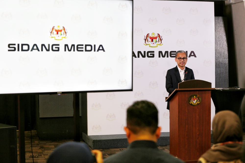 Communications Minister Fahmi Fadzil speaks at a press conference at his ministry in Putrajaya, November 15, 2024. — Picture by Choo Choy May