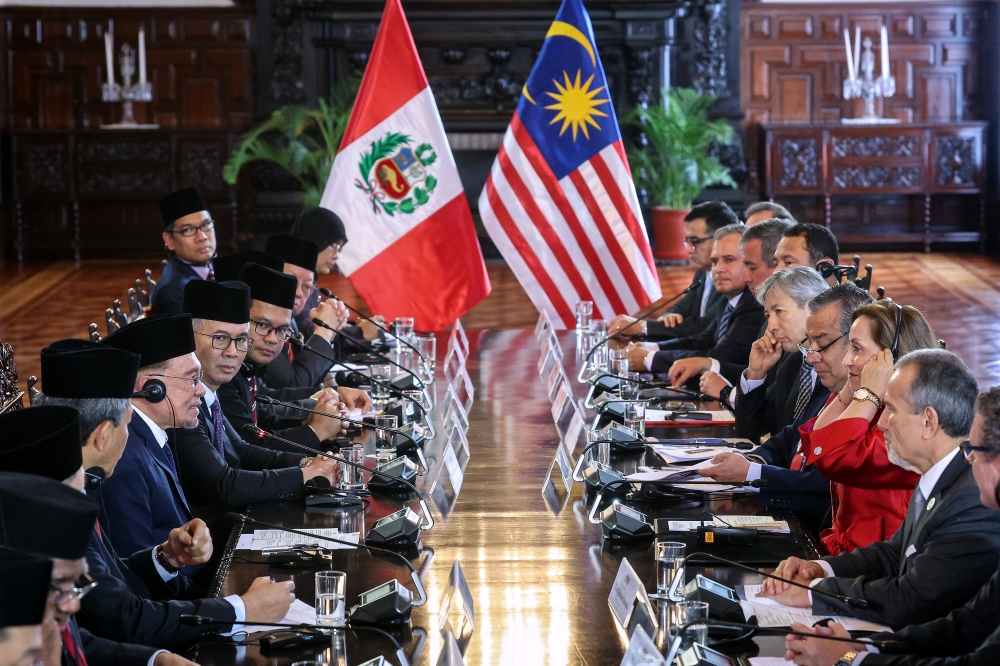Prime Minister Datuk Seri Anwar Ibrahim during a bilateral meeting with President of Peru Dina Ercilia Boluarte Zegarra in Tupac Amaru Hall at the Government Palace in Lima, November 14, 2024. Anwar, who is also Malaysia’s finance minister is accompanied by Foreign Minister Datuk Seri Mohamad Hasan and Investment, Trade and Industry Minister Datuk Seri Tengku Zafrul Abdul Aziz. Anwar’s visit, which includes his participation in the 31st Apec Economic Leaders’ Meeting (AELM) from November 14 to 16, is expected to strengthen bilateral relations between Malaysia and Peru. — Bernama pic 