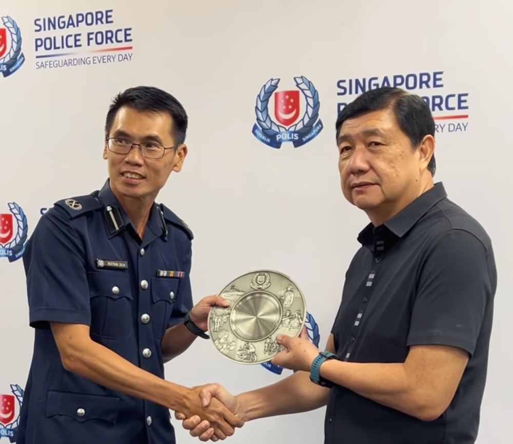 Richard Tan Chai Boon receives the SPF’s Public Spiritedness Award from DAC Bertran Chia, Deputy Commander Jurong Division, at the Jurong Police Division Headquarters November 10, 2024. — Screengrab via Facebook