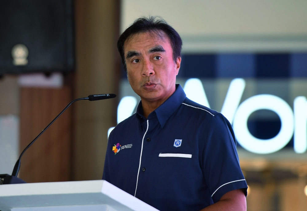 Bank Negara Malaysia (BNM) Deputy Governor Adnan Zaylani Mohamad Zahid delivers a speech at the Closing Ceremony of the Sarawak Financial Literacy Carnival and Financial Literacy Month 2024 here, today.