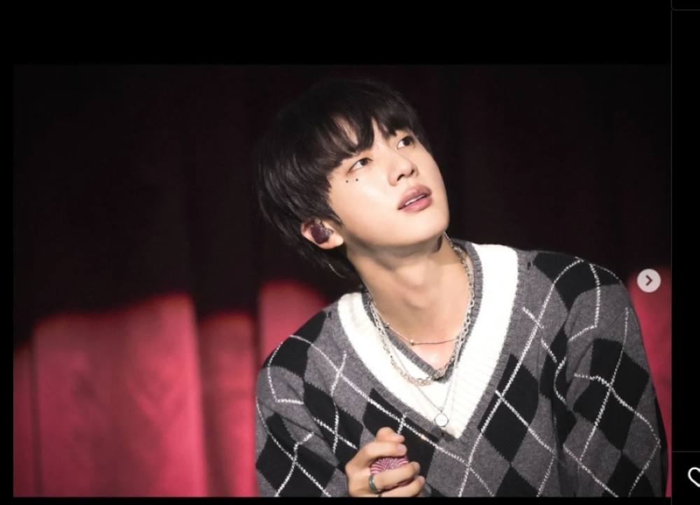 All of the singer’s songs from the ‘Happy’ album have managed to successfully enter Spotify’s Global Top Songs chart. — Picture from Instagram/Jin 