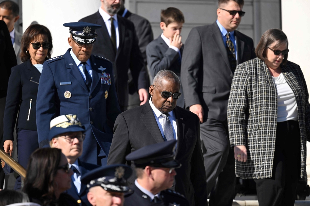 US Defense Secretary Lloyd Austin (centre) signed the deal with his Philippine counterpart Gilberto Teodoro at the start of a visit to Manila that also included a closed-door meeting with President Ferdinand Marcos. — AFP pic