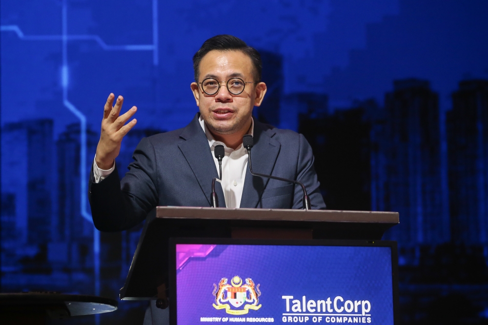 HR Minister Steven Sim Chee Keong speaks during the launch of the Impact Study of AI, Digital and Green Economy on the Malaysian Workforce at MITEC in Kuala Lumpur November 18, 2024. — Picture by Yusof Mat Isa