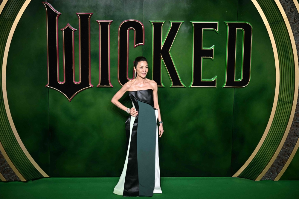 Tan Sri Michelle Yeoh poses on the red carpet upon arrival for the UK premiere of the film ‘Wicked’ at the Royal Festival Hall in London November 18, 2024. — AFP pic